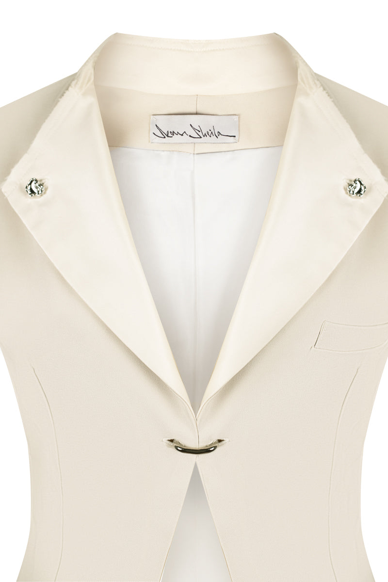 Sean Sheila eggshell vest with a single hook, showcasing the stylish collar and front closure, perfect for casual tops.