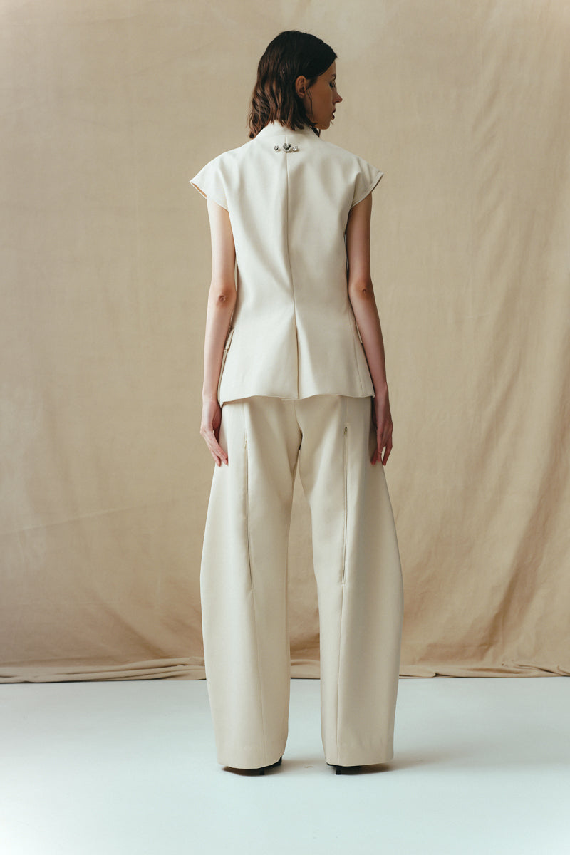 Sean Sheila eggshell vest with a single hook, stylish sleeveless top featuring a clean design and back view.
