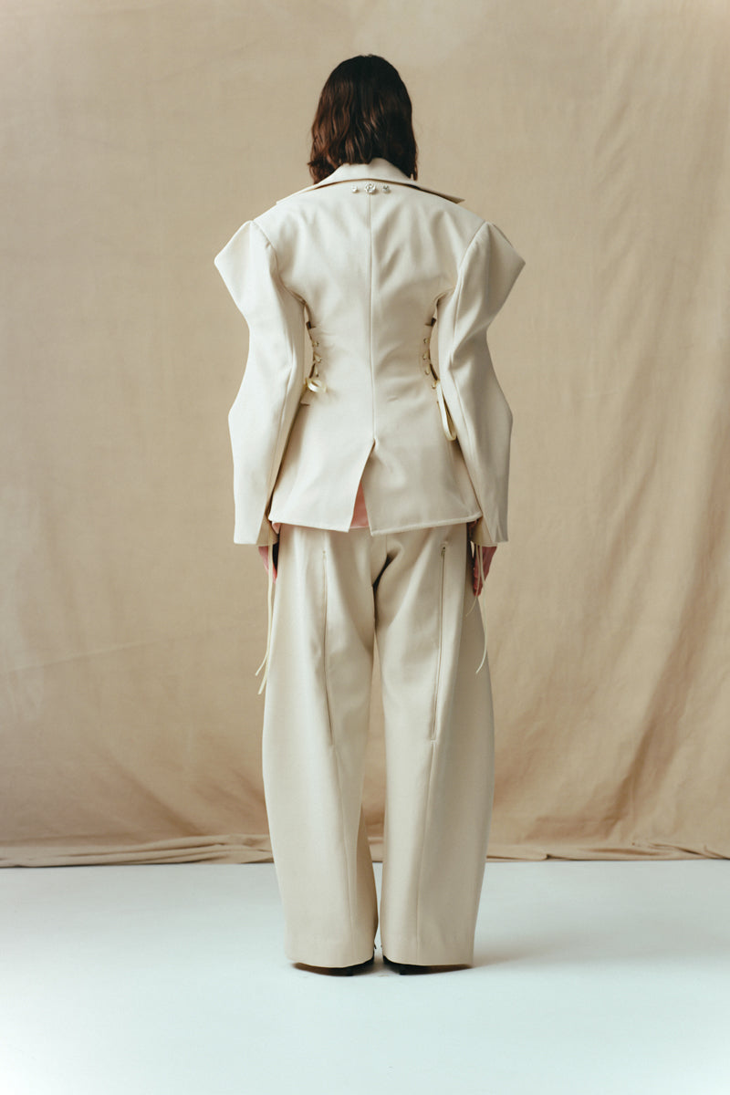 Sean Sheila collared jacket with structured sleeves, showcasing a stylish back view from the FW25 collection.