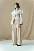 Sean Sheila collared jacket with structured sleeves, stylish outerwear featuring a tailored fit and modern design.
