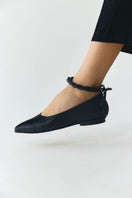 ALTA ARIA black flats with sleek design and pointed toes, perfect for casual or formal wear.