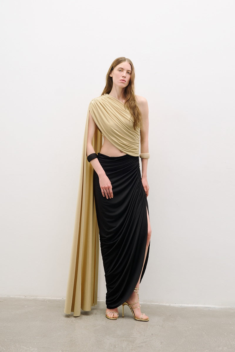 Black and gold detailed draped midi dress by AWAVE, featuring elegant fabric and intricate design elements.