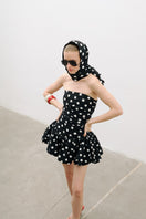 AWAVE ruched strapless mini dress with a balloon skirt, featuring a fitted bodice and playful, voluminous skirt design.