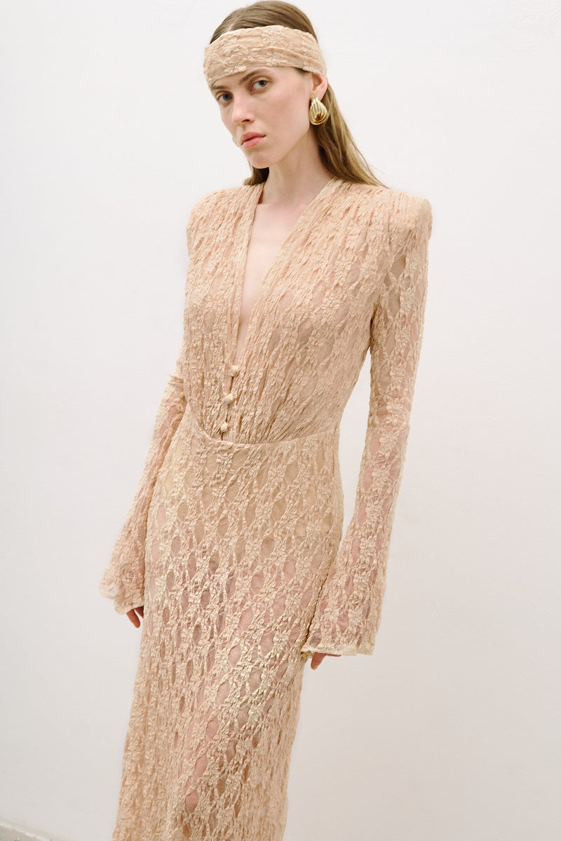 Light pink salmon long sleeved maxi dress by AWAVE, flowing fabric, elegant design perfect for formal or casual occasions.