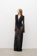 Black long-sleeved maxi dress by AWAVE featuring a flowing silhouette and elegant design, perfect for formal or casual wear.