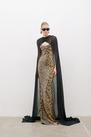 AWAVE leopard print maxi gown with thin straps, featuring a detailed cape design, elegant and flowy for formal occasions.
