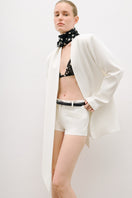 AWAVE polka dot adjustable bralette with shawl, shown as a stylish top, featuring polka dot pattern and lightweight fabric.