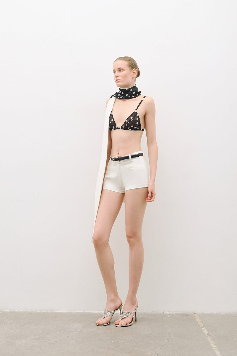 AWAVE suit set featuring a jacket with a detachable shawl collar and matching mini shorts, stylish and modern ensemble.