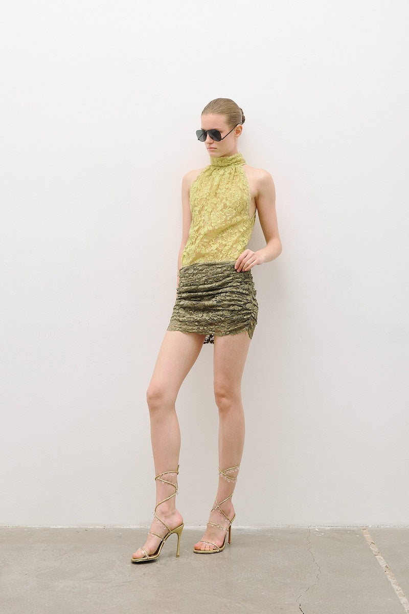 AWAVE turtleneck bodysuit with draped mini skirt, stylish mini dress featuring a sleek turtleneck and elegant drape detail.
