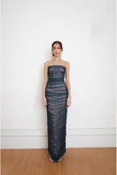 Teal fade maxi gown by YASSMIN SALEH featuring a flowing design and elegant neckline, front view.