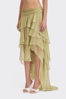 Green layered fairy maxi skirt from Stolen Stores, flowing fabric with a whimsical, bohemian style for casual or festival wear.