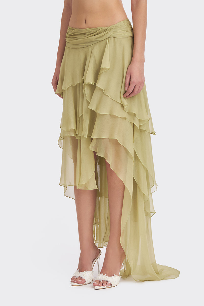 Green layered fairy maxi skirt from Stolen Stores, flowing fabric with a whimsical, bohemian style for casual or festival wear.