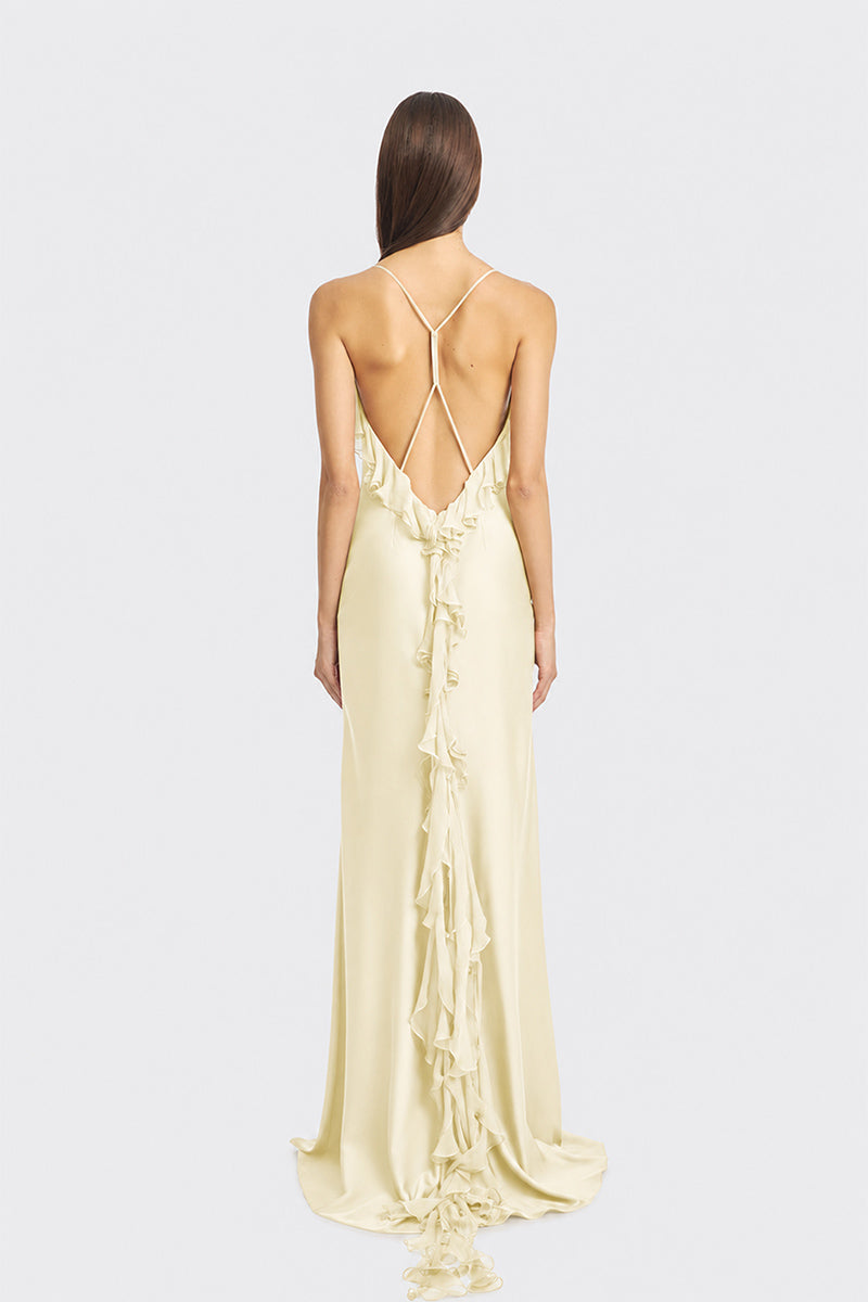 Light yellow fairy ruffle maxi dress by Stolen Stores, flowing gown with delicate ruffles and elegant design.