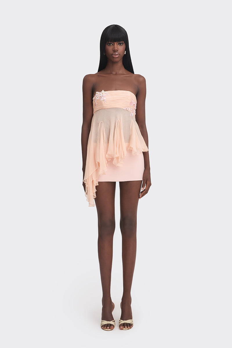 Peach fairy tube top by Stolen Stores featuring a fitted style and delicate fabric, perfect for casual or summer outfits.