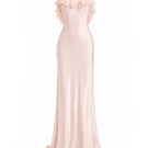 Light pink fairy ruffle maxi dress by Stolen Stores, flowing gown with layered ruffles and delicate design.