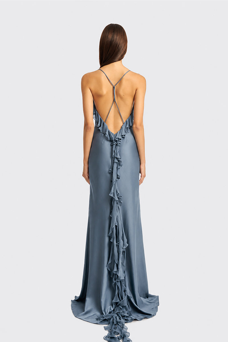 Dusty blue fairy ruffle maxi dress by Stolen Stores, featuring flowing fabric and elegant design for special occasions.