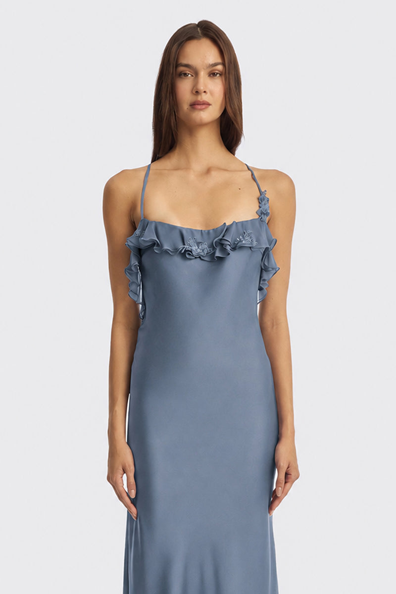 Dusty blue fairy ruffle maxi dress by Stolen Stores, featuring flowing fabric and romantic ruffle details.