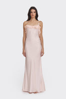 Light pink fairy ruffle maxi dress by Stolen Stores, flowing gown with delicate ruffle details and elegant design.