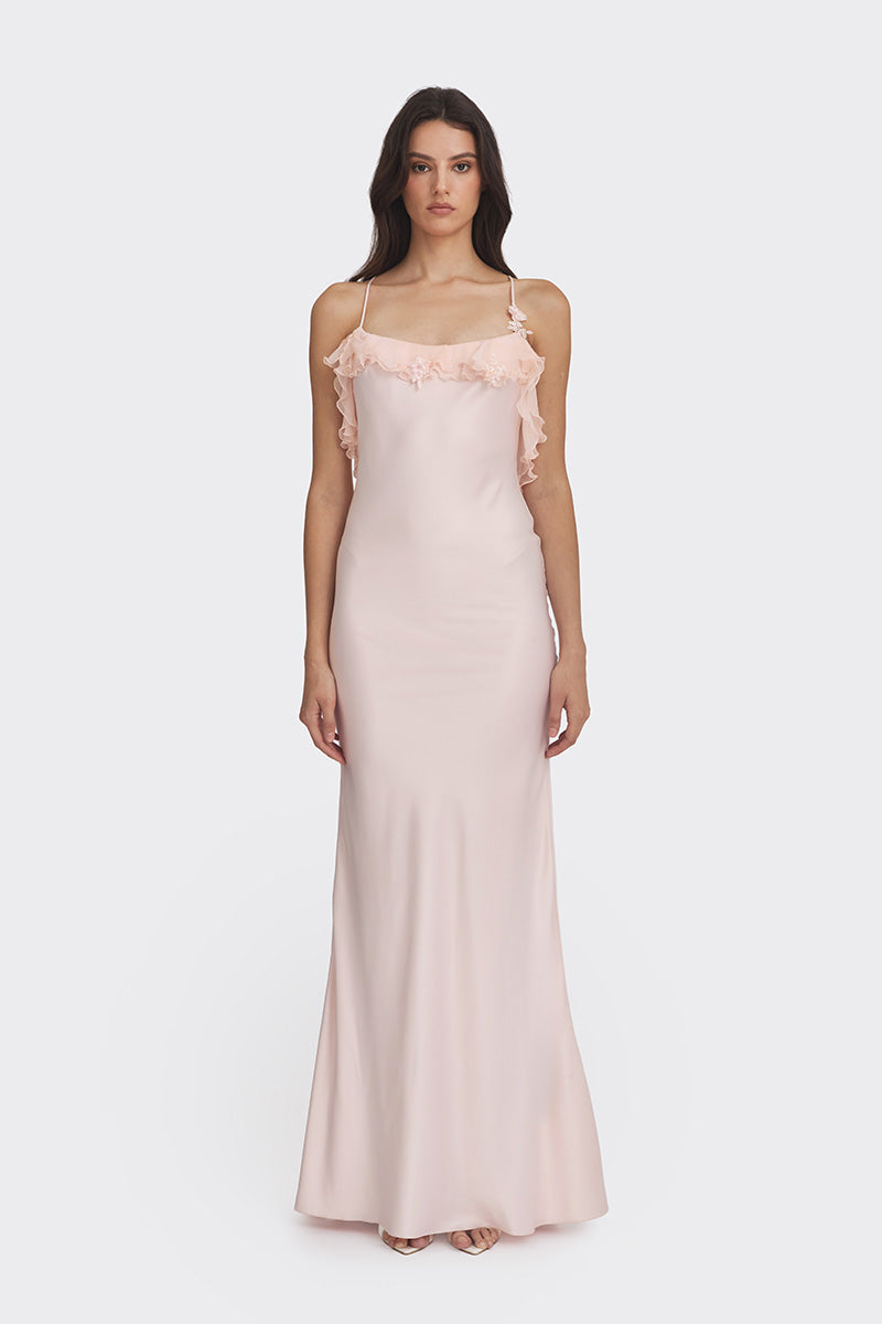 Light pink fairy ruffle maxi dress by Stolen Stores, flowing gown with delicate ruffle details and elegant design.