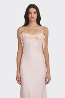 Light pink fairy ruffle maxi dress by Stolen Stores, flowing gown with layered ruffles and elegant design.