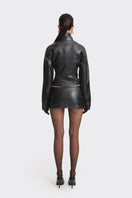 Black faux leather racing belt jacket by Stolen Stores, featuring a stylish design with belt accents and a sleek fit.
