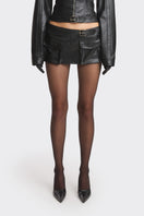 Black faux leather mini skirt with racing belt detail from Stolen Stores, featuring a sleek, fitted design and stylish racing-inspired accents.