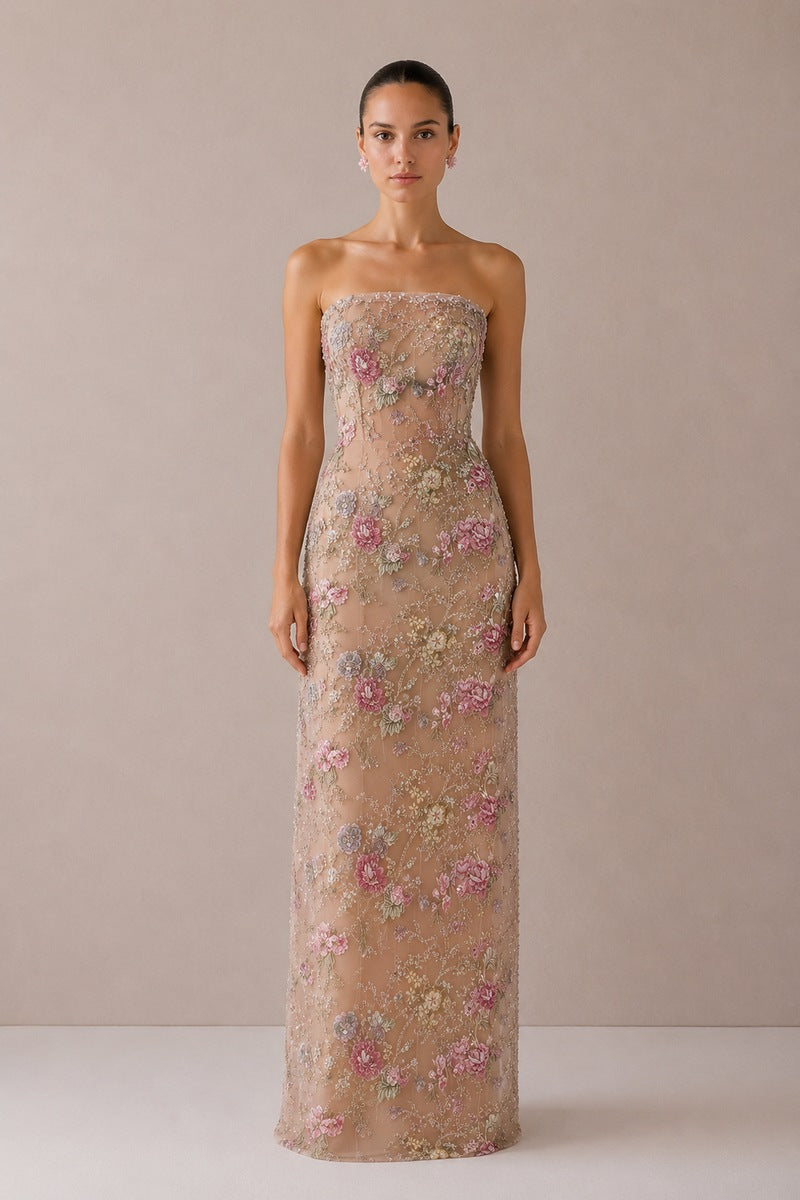 Nihan Peker beige Fay gown with elegant draping and long sleeves, displayed on a mannequin.