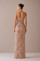 Nihan Peker beige Fay gown featuring elegant fabric and flowing design, perfect for formal occasions.