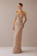 Nihan Peker beige Fay gown with elegant flowing design and delicate fabric, perfect for formal occasions.