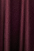 Elegant burgundy red feather long gown by MANITO, featuring silky fabric and flowing design perfect for formal occasions.