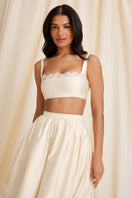 Scarlett Gasque Fiorella bralette top in cloud dancer color, front view showing lace details and delicate straps.