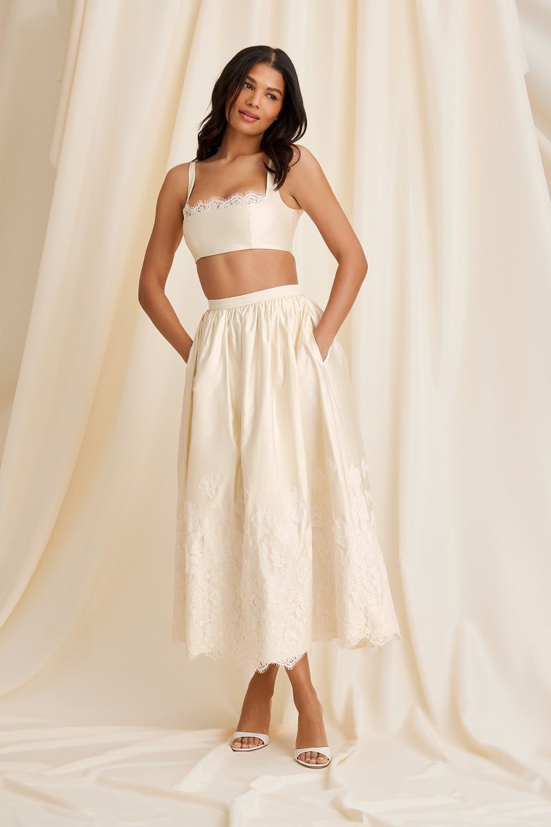 Scarlett Gasque Fiorella Bralette paired with a matching skirt, featuring a soft, cloud-inspired fabric in a stylish set.