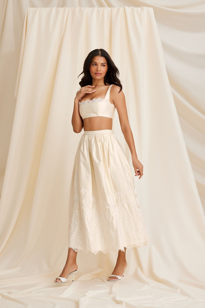 Scarlett Gasque Fiorella maxi skirt in soft fabric with a cloud dancer pattern, styled with a matching bralette.