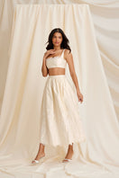Scarlett Gasque Fiorella Maxi Skirt in Cloud Dancer fabric paired with a matching bralette, stylish and flowing for elegant wear.