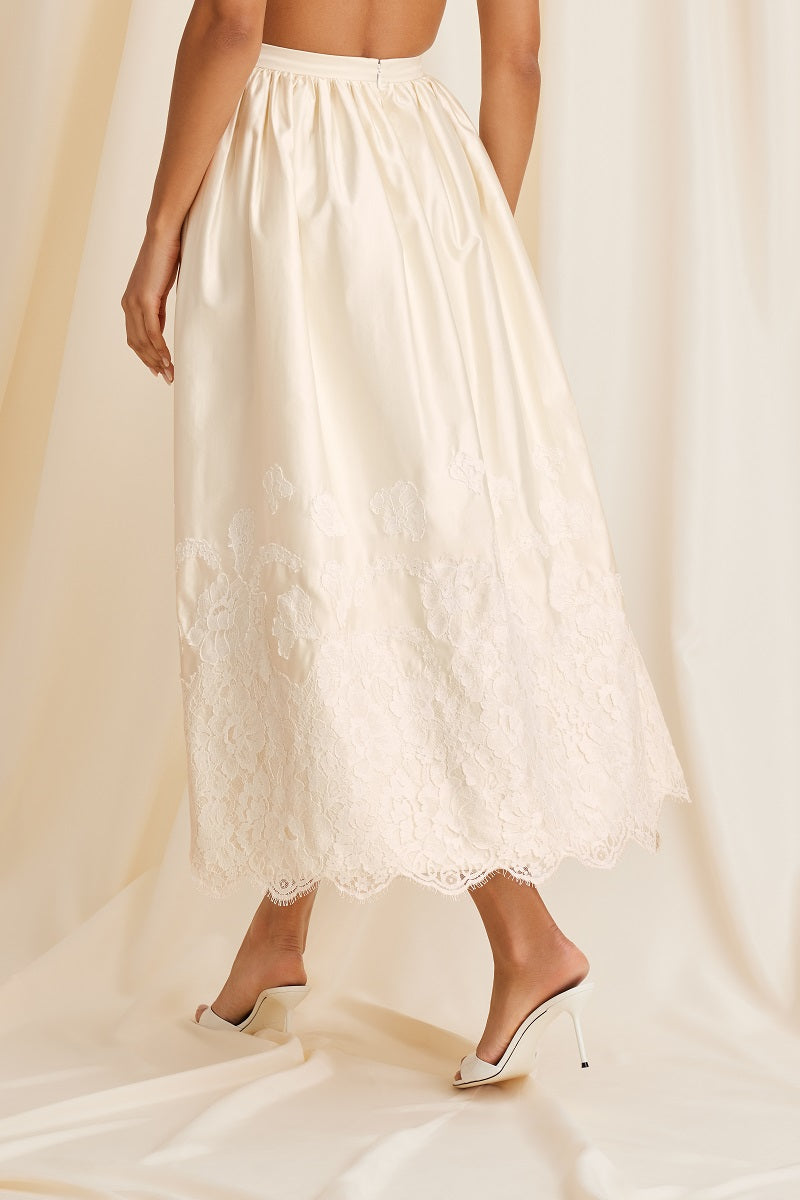 Scarlett Gasque Fiorella Maxi Skirt in Cloud Dancer fabric, back view showcasing flowing design and elegant length.
