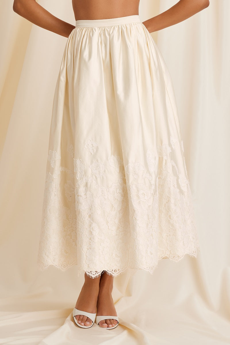 Scarlett Gasque Fiorella maxi skirt in cloud dancer fabric, front view showing flowy, light design perfect for casual or dressy wear.