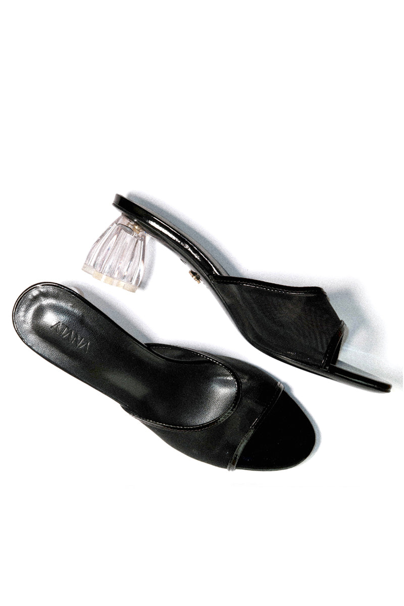 Black patent and mesh glass heel shoes from House of Atana's Fiorellini collection, featuring stylish pointed heels.