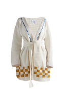 First Born Knits La Palme cardigan featuring a stylish floral pattern and soft knit fabric.