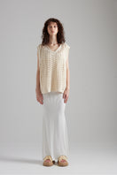 First Born Knits Amelie Knit top in soft fabric, featuring a cozy fit and stylish design, worn by a model in a casual setting.
