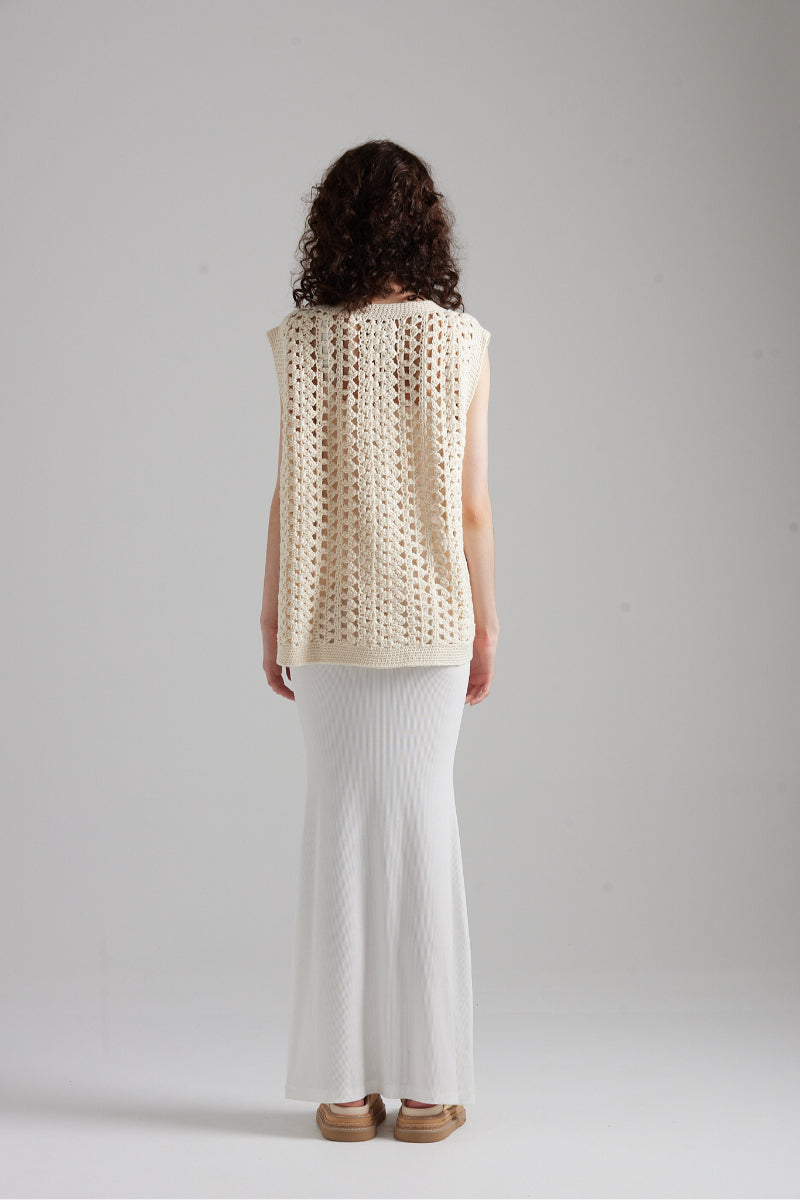 First Born Knits Amelie Knit top, a cozy, stylish knit blouse with a textured pattern and relaxed fit.