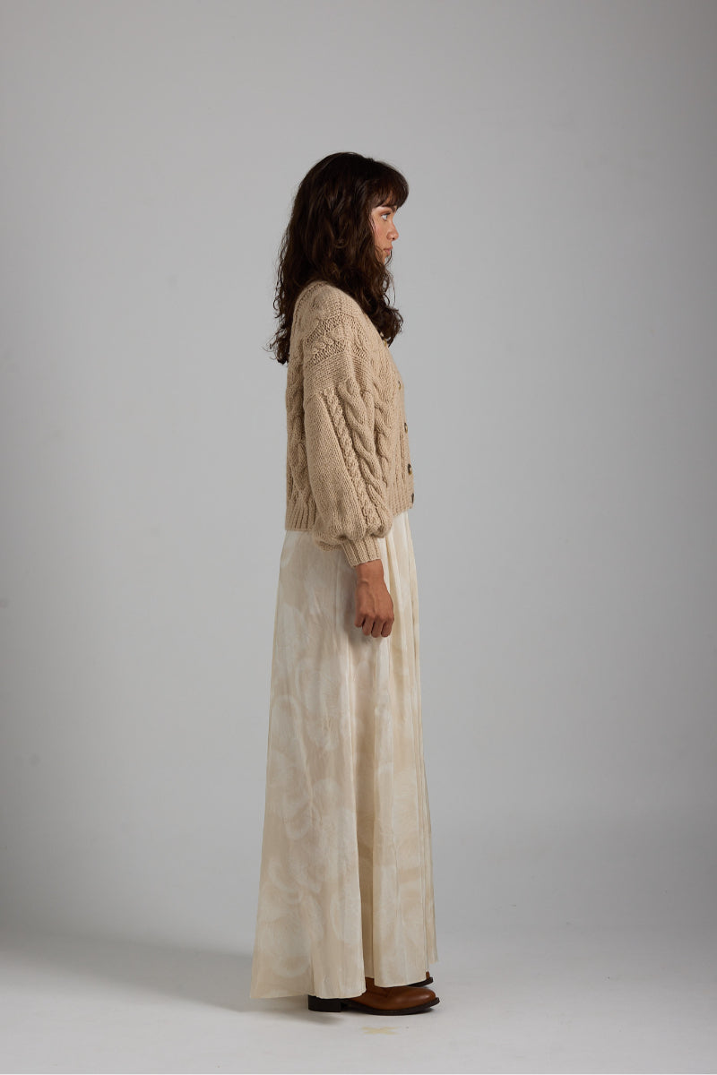 Light beige LULU cardigan by First Born Knits, featuring a cozy knit design and button-up front, perfect for casual wear.