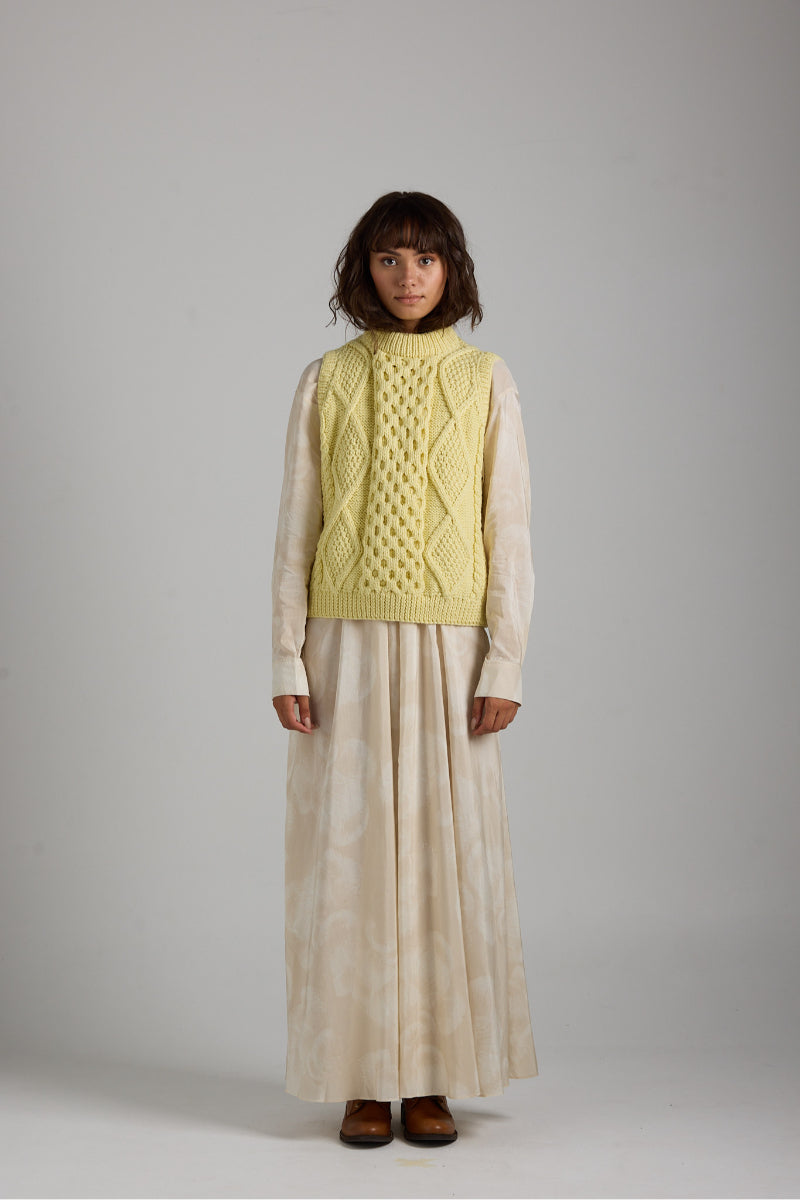 First Born Knits Tierra Vest in cozy knitwear style, showcasing a textured, earthy-toned vest with ribbed details.