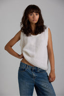 White Chloe vest from First Born Knits, a stylish knit top featuring a cozy, fitted design perfect for layered looks.