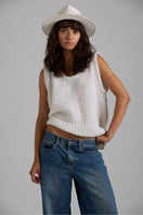White Chloe vest from First Born Knits, a stylish sleeveless knit top displayed on a neutral background.