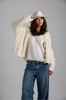 First Born Knits Paris Cardigan, soft knit cardigan with a classic design, perfect for layering and stylish comfort.
