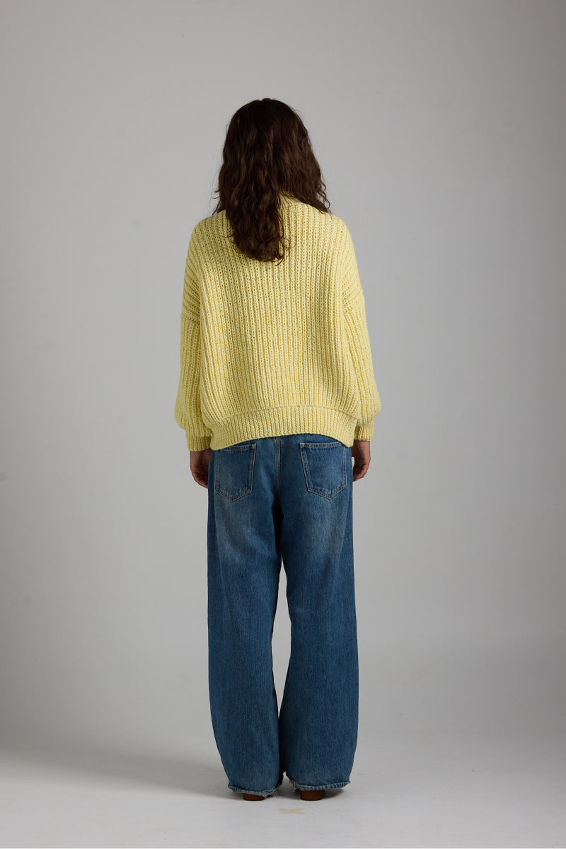Soft shell sweater by First Born Knits, featuring a cozy fit and textured fabric, ideal for casual wear.