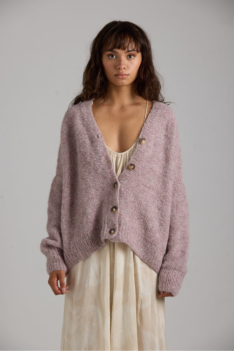 Purple Coco cardigan by First Born Knits, featuring a cozy knit design and stylish fit, displayed on a neutral background.