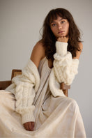 Light gray Paris cardigan by First Born Knits featuring a cozy knit design and button closure.
