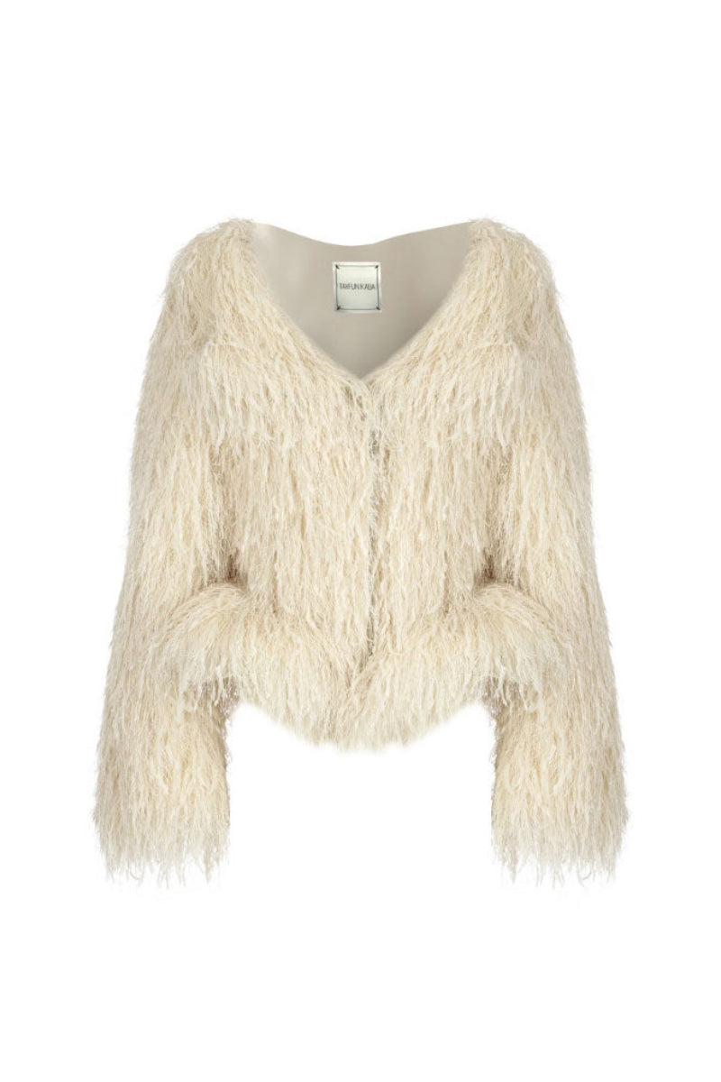 Beige fitted fur jacket by Tayfun Kaba, showcasing a stylish warm jacket with a tailored fit and plush fur details.