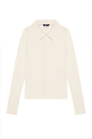 White fitted rib button-down shirt by Bassigue, showing the tailored collar and ribbed fabric detail.